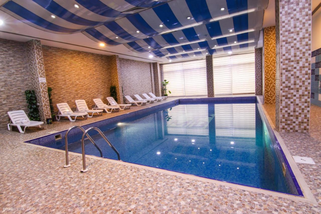 Mnawi Basha Hotel Basra Buitenkant foto